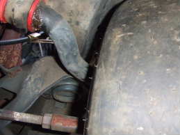 Inside left front fender